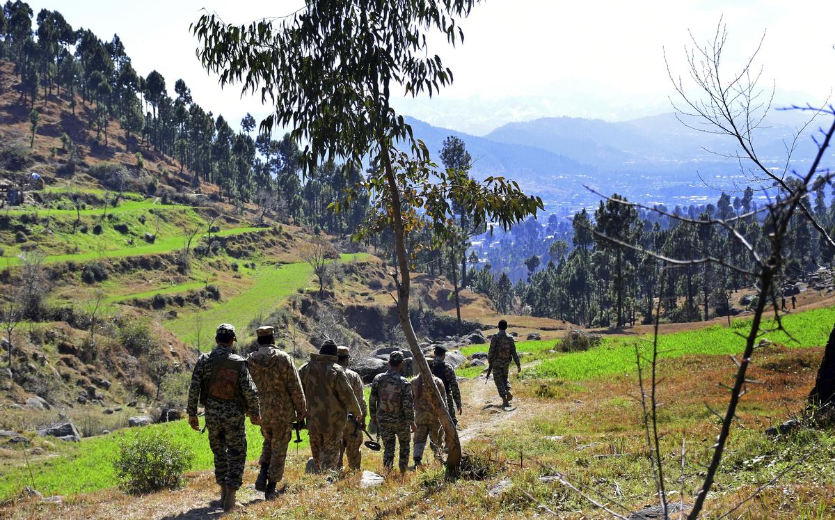 Pakistani soldiers patrol in the area where Indian planes were reportedly shot down by them, after India launched airstrikes in Jaba, near Balakot, Pakistan, in 2019. 