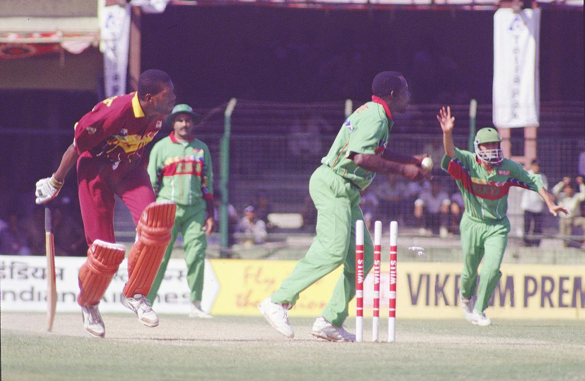 Kenyan cricketers celebrate the run out of Curtly Ambrose  in a World Cup cricket match between Kenya and West Indies at Pune, India on February 29, 1996. 

S. Subramanium