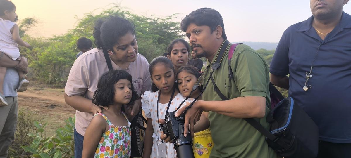 Vivek Rathod of WCTRE during a birdwatching session in Visakhapatnam.