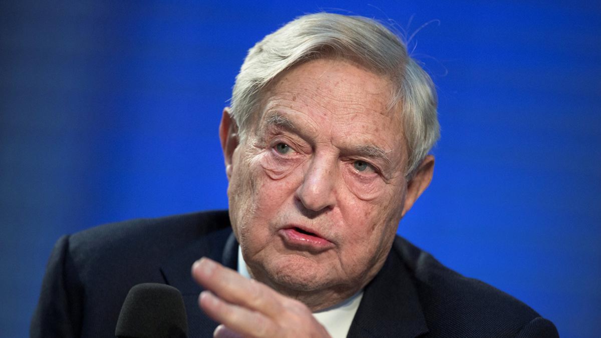 Billionaire George Soros hands control of empire to son Alex