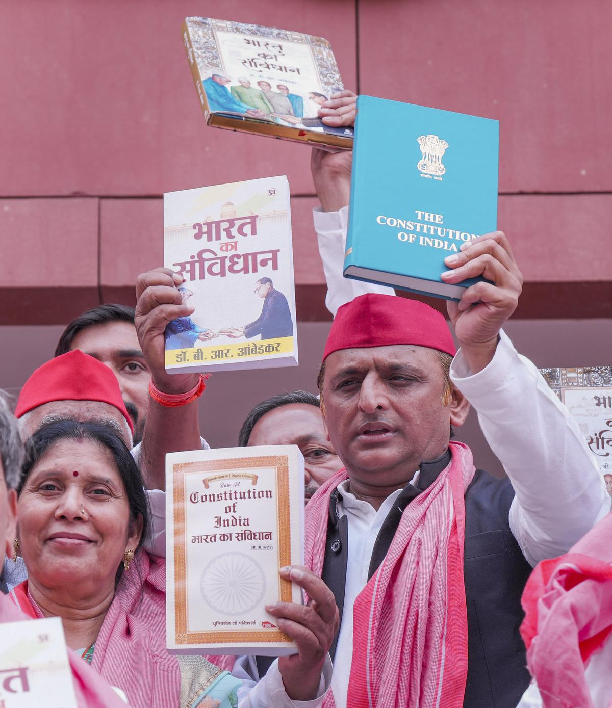 Watch: Opposition MPs protest outside Parliament, hold copies of Constitution