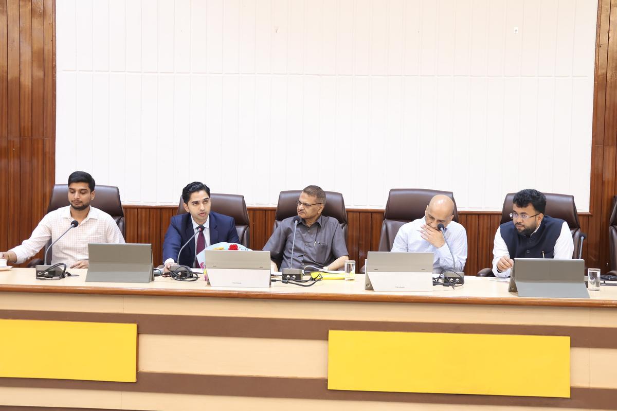 Karnataka State Backward Classes Commission member C.M. Kundagol chairing a meeting of officials to review the progress of work under the ongoing social and educational sruvey in Belagavi.