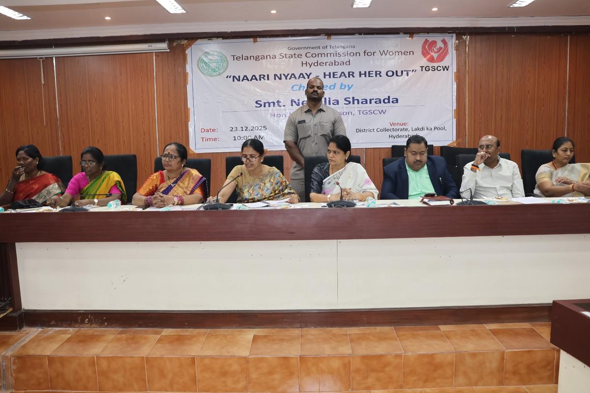 Telangana State Commission for Women Chairperson Sharada Nerella and Deputy Commissioner of Police, Women Safety Wing, Hyderabad, Lavanya Naik along with other members of the commission at the open hearing in Hyderabad on Tuesday, December 23