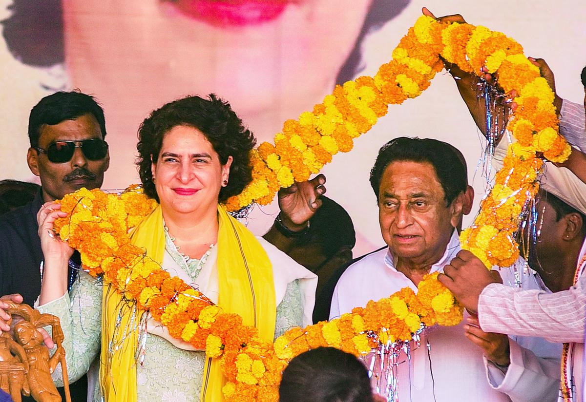 Congress general secretary Priyanka Gandhi with Madhya Pradesh Congress president Kamal Nath being garlanded during the party’s Jan Aakrosh Yatra, in Mandla district, Madhya Pradesh, on Oct. 12, 2023. Congress general secretary Priyanka Gandhi with Madhya Pradesh Congress president Kamal Nath being garlanded during the party’s Jan Aakrosh Yatra, in Mandla district, Madhya Pradesh, on Oct. 12, 2023.