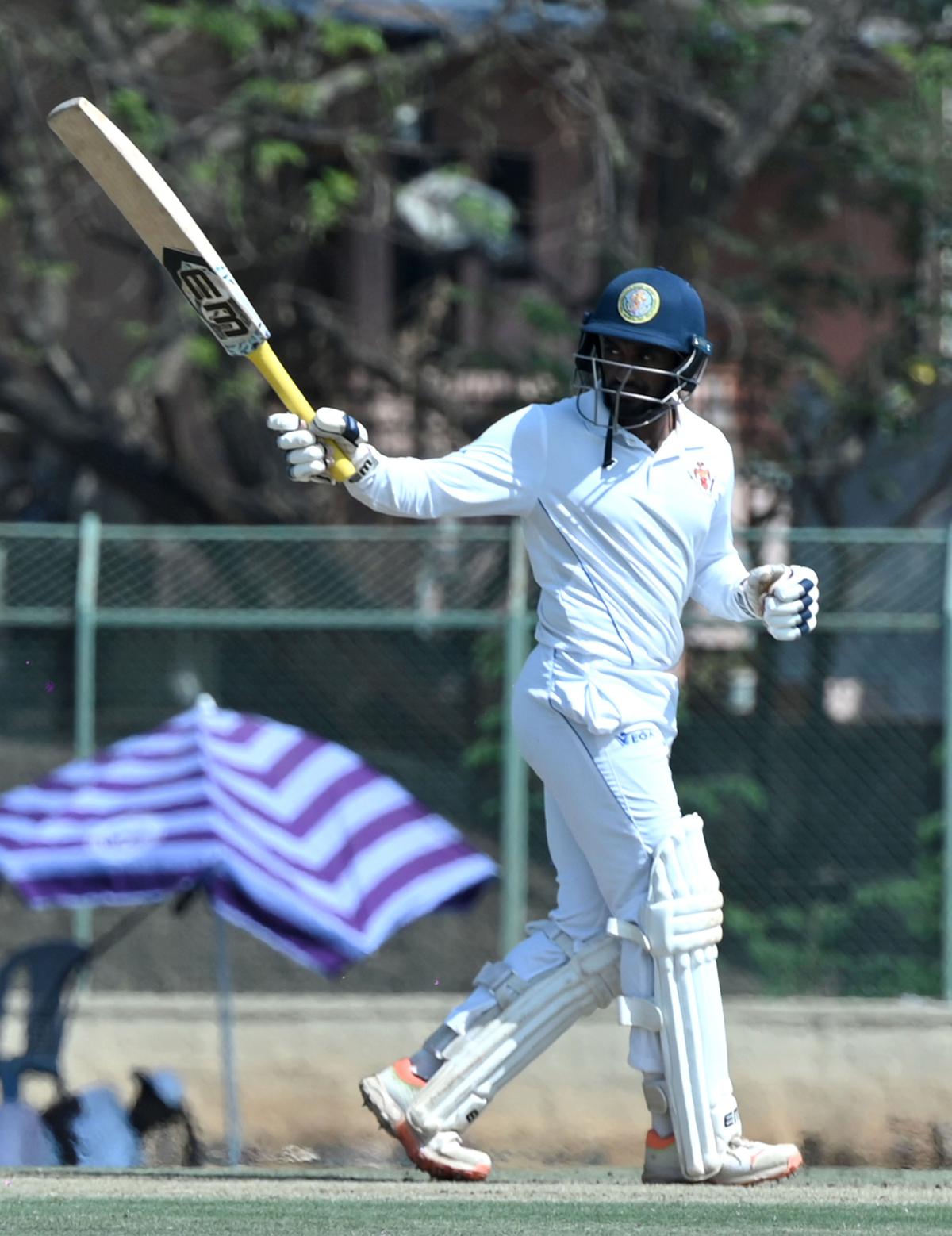 Sharath Srinivas of Karnataka celebrates after scoring a ton.