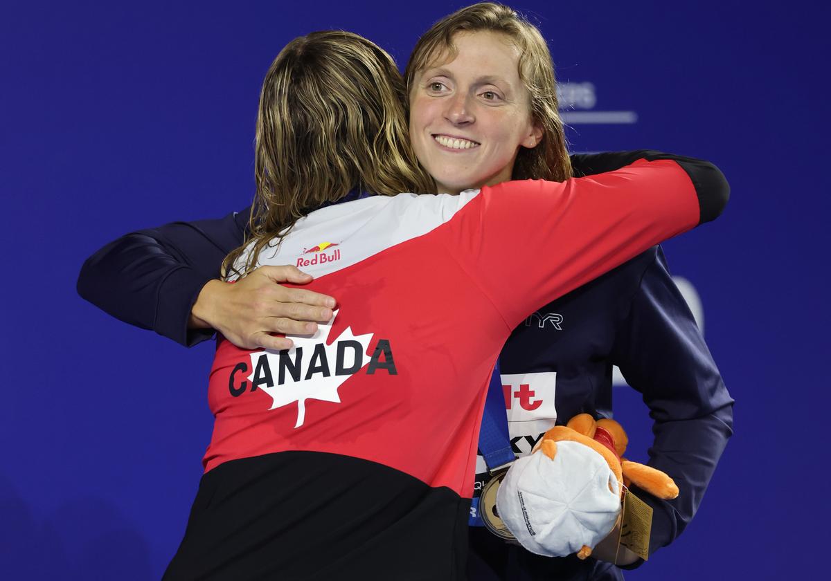 Embracing greatness: McIntosh grew up idolising Katie Ledecky, but now is her biggest rival. ‘Katie always brings the best out of me,’ the teen says. Embracing greatness: McIntosh grew up idolising Katie Ledecky, but now is her biggest rival. ‘Katie always brings the best out of me,’ the teen says.
