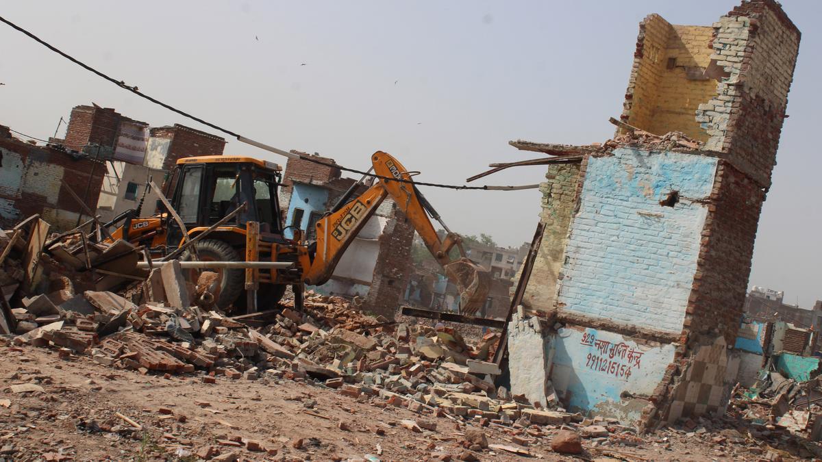 https://th-i.thgim.com/public/incoming/nvurd5/article69684472.ece/alternates/LANDSCAPE_1200/01_Demolition%20Bhoomiheen%20Camp.jpg