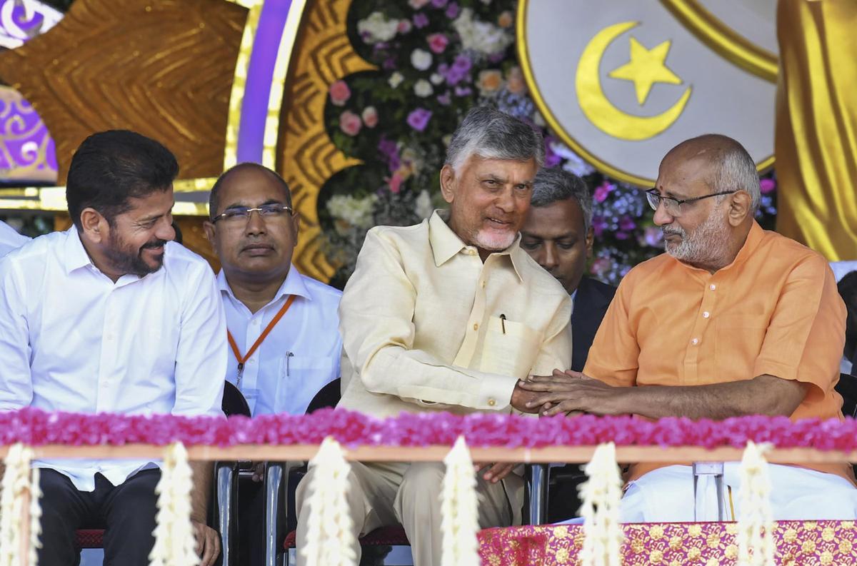 Vice President CP Radhakrishnan, Andhra Pradesh Chief Minister Nara Chandrababu Naidu and Telangana Chief Minister A. Revanth Reddy during the centenary celebrations of Sri Sathya Sai Baba, in Puttaparthi, Andhra Pradesh on Sunday (November 23).  
