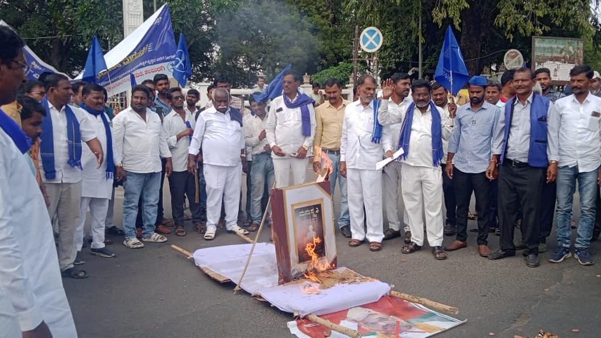 Manusmriti set on fire commemorating Ambedkar burning the text in 1927