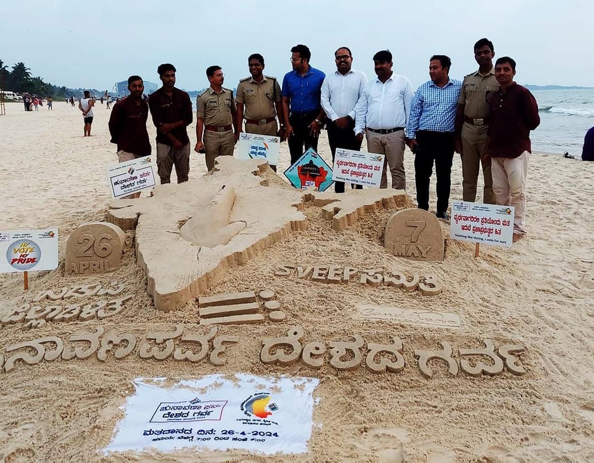 Artists of Sand Theme of Udupi – Harish Saga, Santhosh Bhat Halady and Ujwal Nitte – made a sand art on the Malpe Beach in Udupi on Sunday to create awareness among people to vote in the coming Lok Sabha elections.