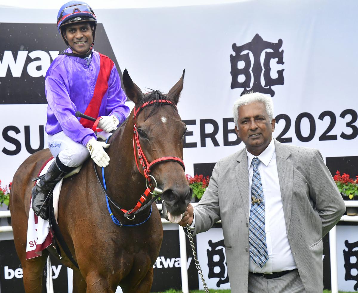 Success (Suraj Narredu up) being led in by trainer Vijay Singh after her win in the Usha Stud Golden Jubilee Bangalore St. Leger in Bengaluru on July 23, 2023. 