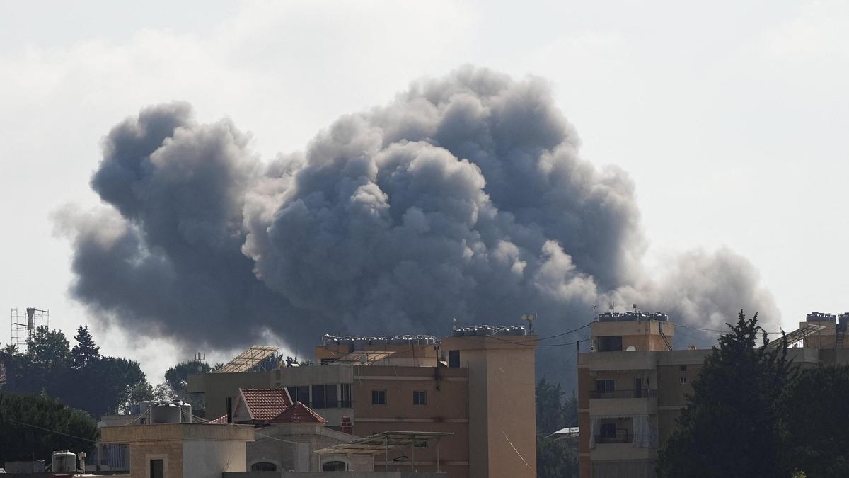 Israeli strike on village in eastern Lebanon kills 12, as Israel calls up more troops there
