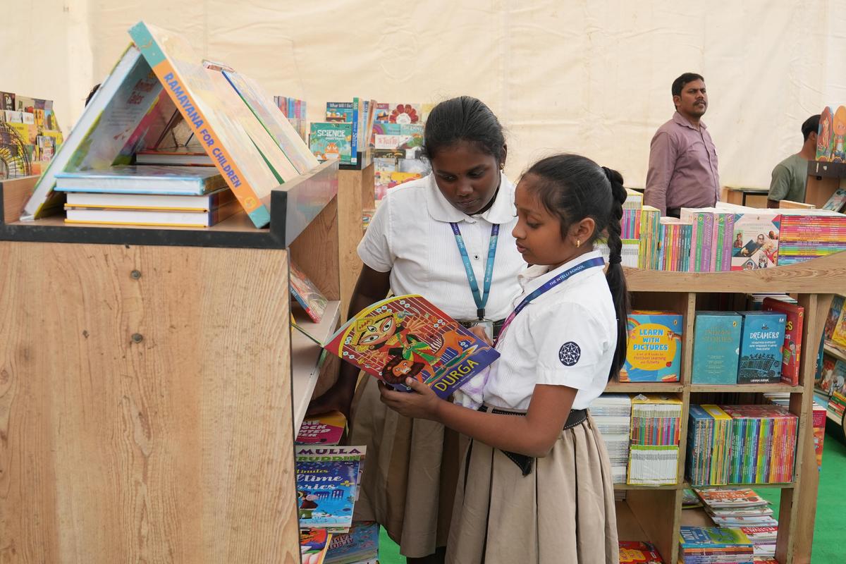 Children browse through books at the Vizag Junior Lit Fest in Visakhapatnam on Thursday.