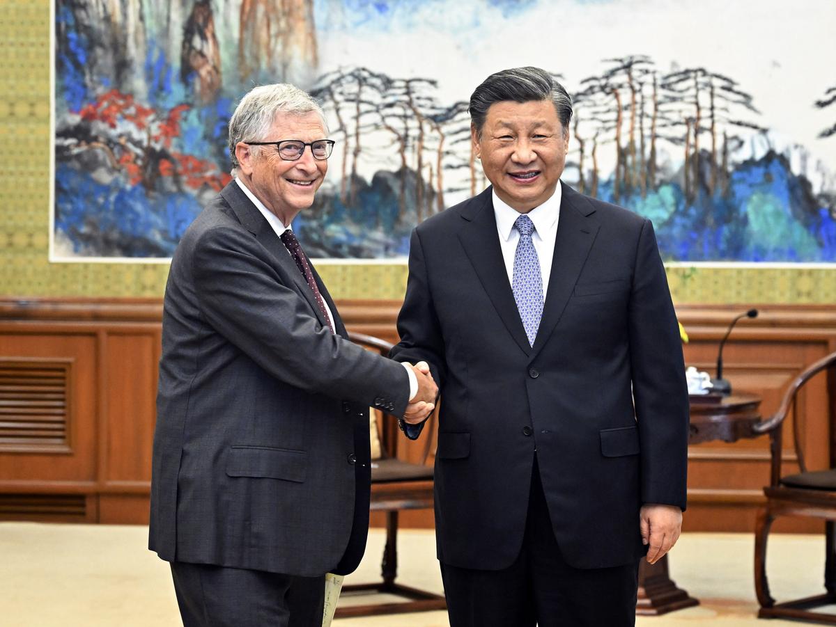 In this photo released by China’s Xinhua News Agency, Bill Gates, left, meets with Chinese President Xi Jinping in Beijing, on June 16, 2023. 