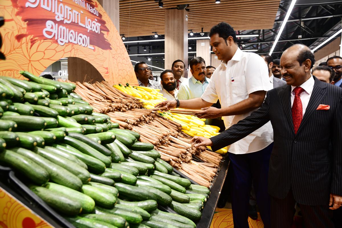 Minister for Industries, Investment and Commerce TRB Rajaa (Second Right) and Ma Yusuf Ali, Chairman and Managing Director of Lulu Group at the Section Showcasing Fresh Product Ond the coimbatore belt