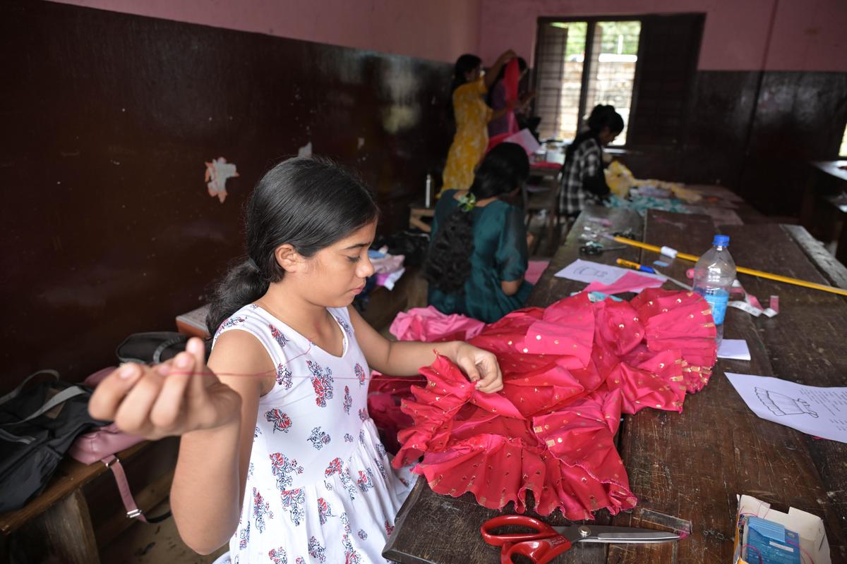 Students from various schools taking part in garments making at the 57th State School Science Fair at BEMS School, Palakkad, on Sunday.