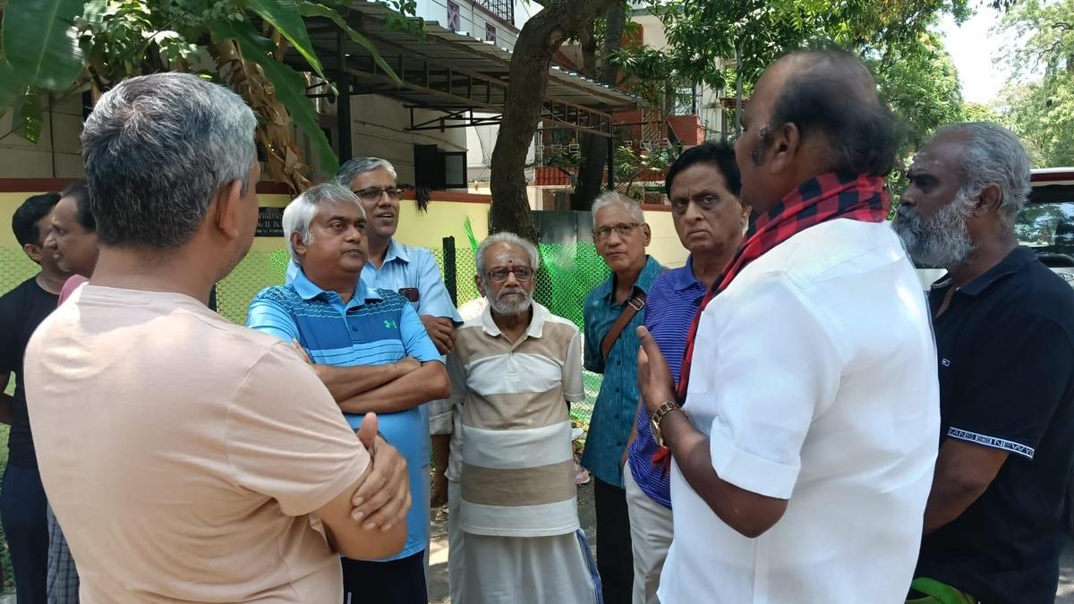 A noon meeting in Jeth Nagar: residents have a chat with sitting Mylapore MLA