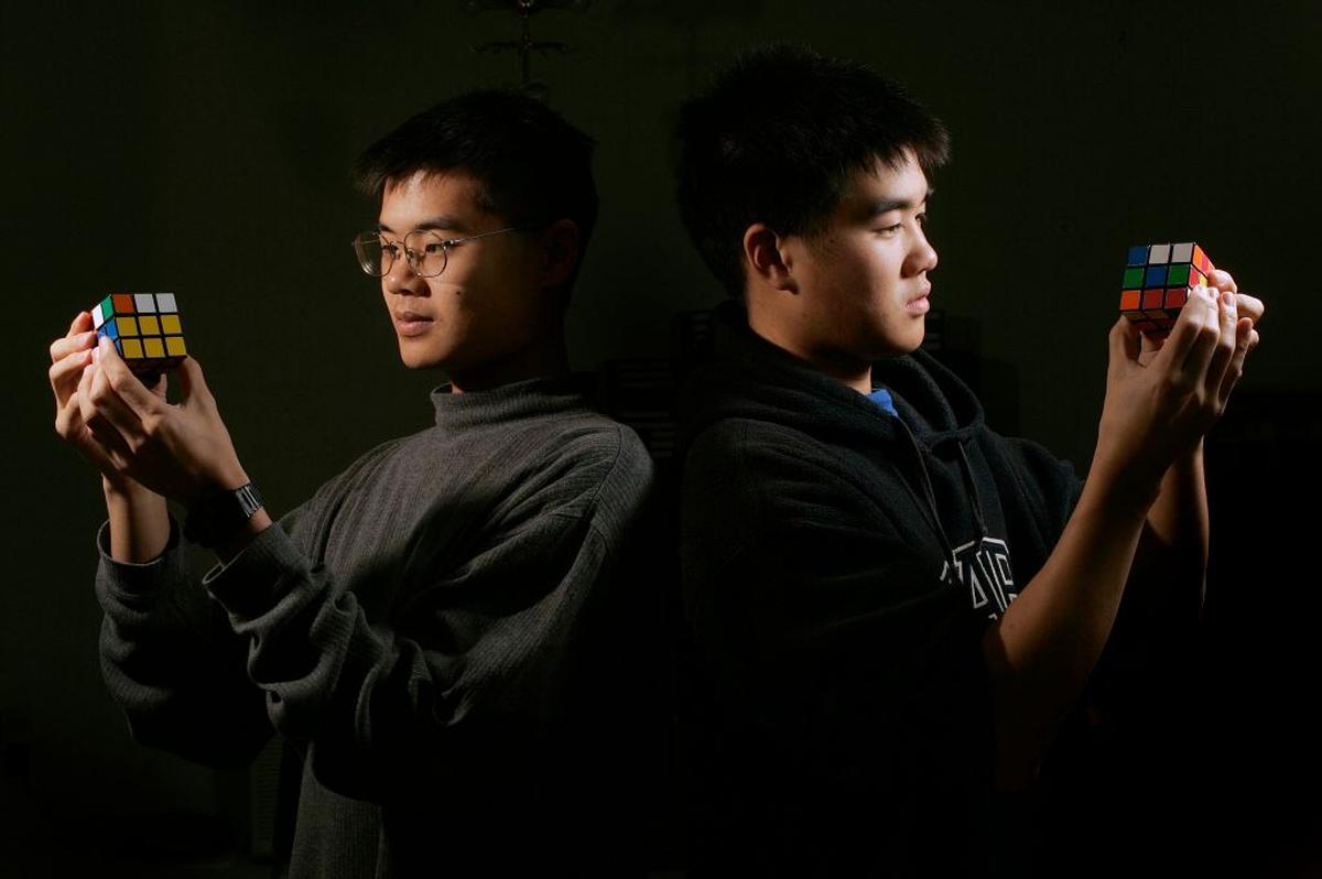 Brothers and speedcubing champions Tyson (left) and Toby Mao in a 2005 file photo. Tyson was hired to train Will Smith for the Rubik's Cube scene in his hit film 'The Pursuit of Happyness'. Brothers and speedcubing champions Tyson (left) and Toby Mao in a 2005 file photo. Tyson was hired to train Will Smith for the Rubik's Cube scene in his hit film 'The Pursuit of Happyness'.