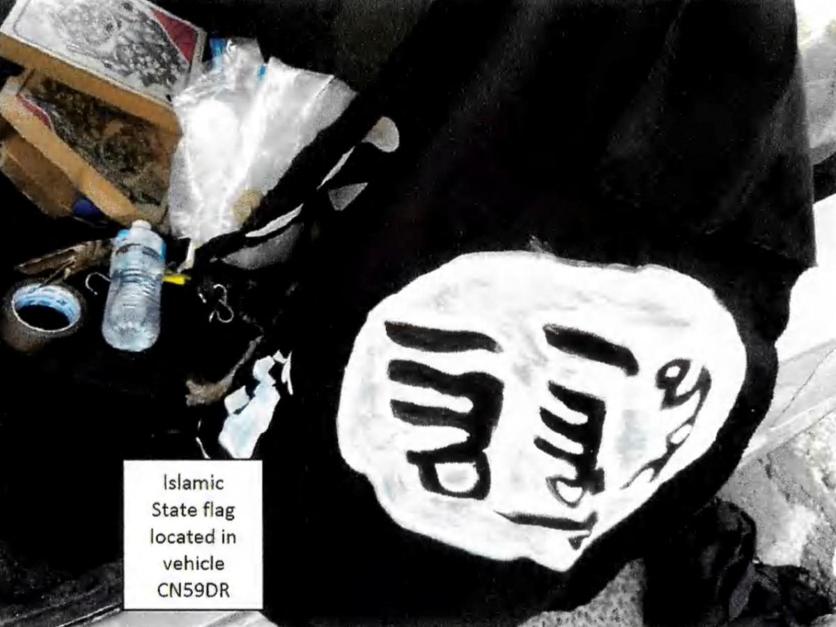 A homemade Islamic State flag located in the vehicle CN59DR, which, according to a court document, is believed to have been used by Sajid and Naveed Akram, suspects in the shooting during a Jewish Hanukkah celebration at Bondi Beach on December 14.