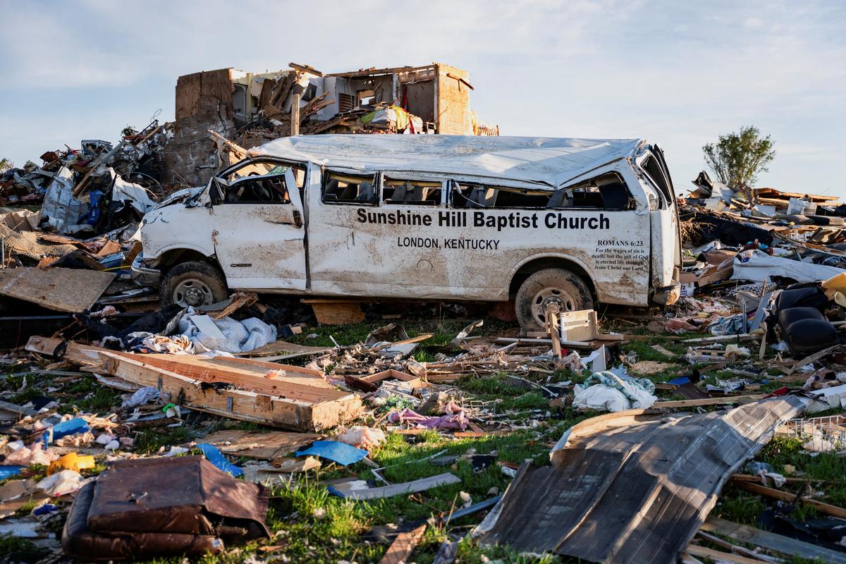 A church van sits destroyed among the debris in the Sunshine Hills neighborhood after a series of tornadoes hit Laurel County, in London, Kentucky, U.S. on May 18, 2025. 