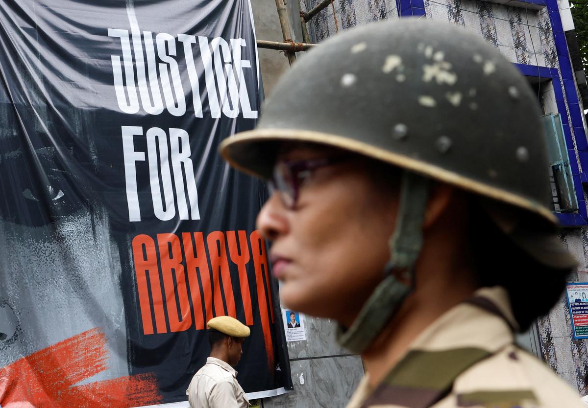 Police personnel on duty outside R.G. Kar Medical College and Hospital in Kolkata, where a young doctor was raped and murdered.