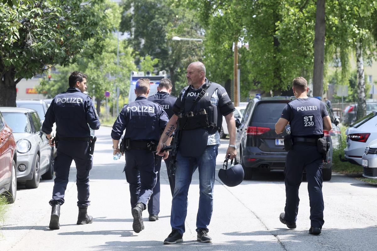 Police officers attend the scene of a shooting at a school in Graz, Austria o June 10, 2025 Police officers attend the scene of a shooting at a school in Graz, Austria o June 10, 2025