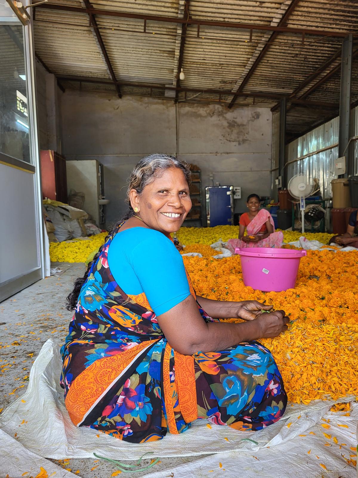 Parvati, 62, working at the Eco Petals factory in Kanuvai, Coimbatore