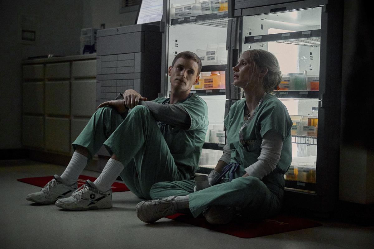 This image released by Netflix shows Eddie Redmayne and Jessica Chastain in a scene from 'The Good Nurse'