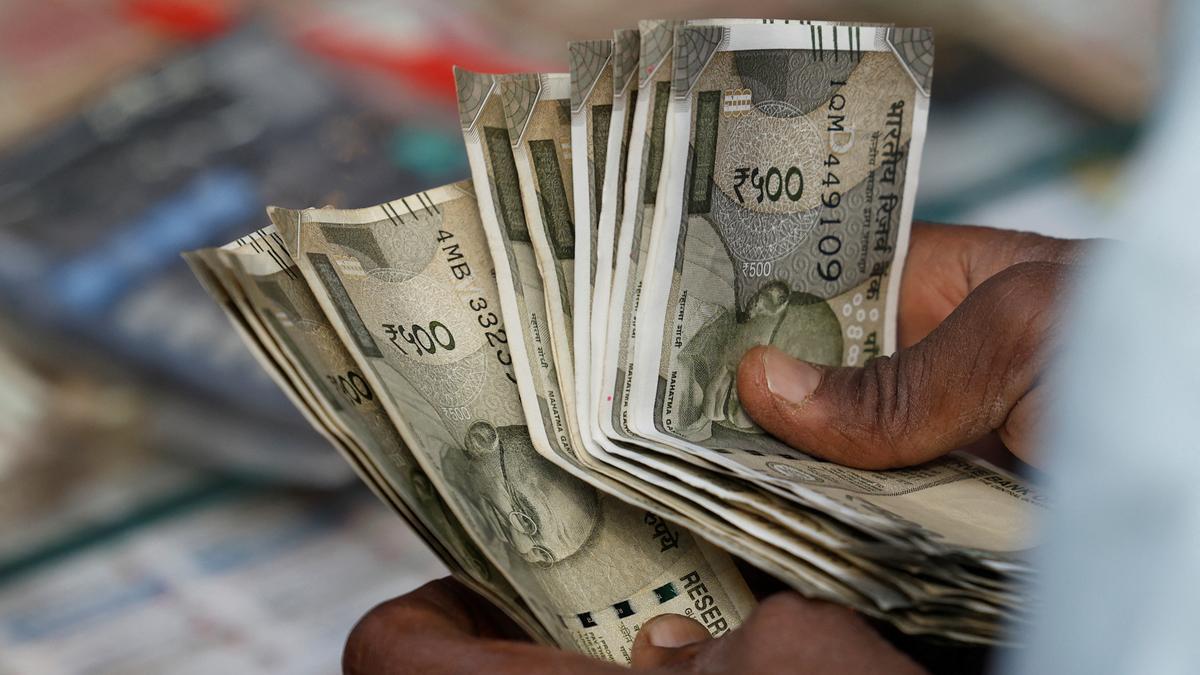 Rupee falls 13 paise to settle at 85.74 against U.S. dollar