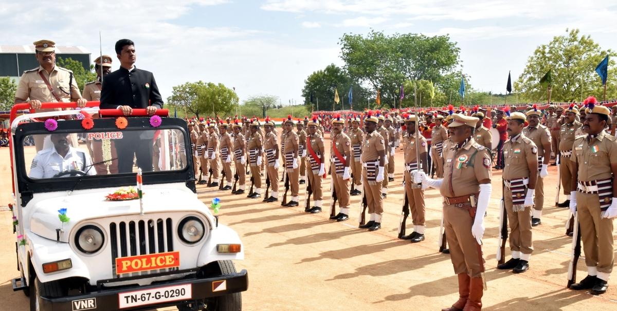 Virudhunagar Collector N. O. Sukhaputra inspects the guard of honour during the Independence Day celebrations held at Virudhunagar on Friday.