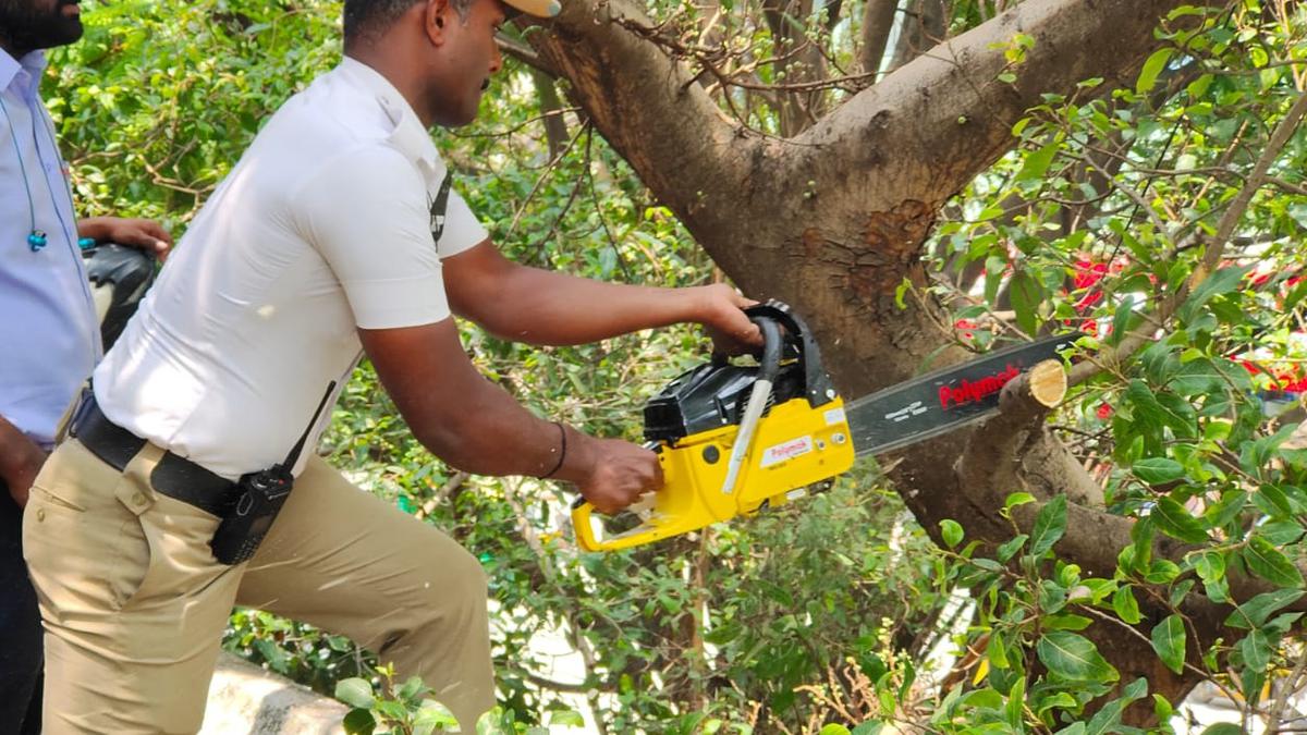 Traffic police get trained in a new skill: clearing broken tree branches and clogged drains