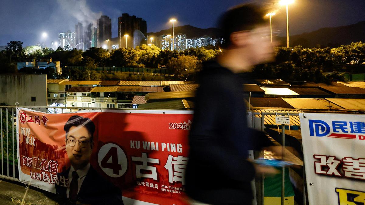 Hong Kong faces low election turnout as residents mourn deadly fire