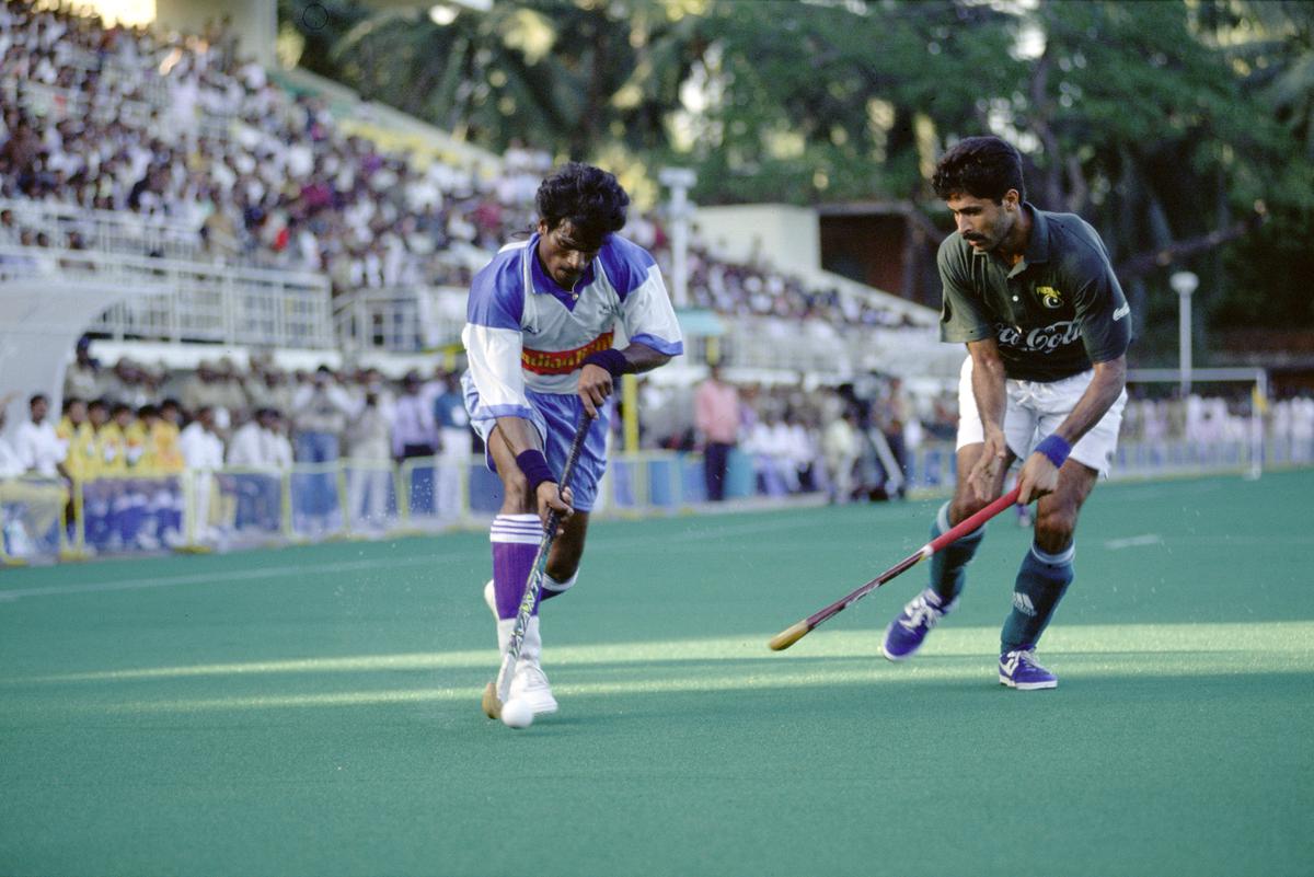 Star attraction: India’s Dhanraj Pillay moves past Pakistan’s Naveed Alam in the SAF Games final which India won 5-2. on December 26, 1995.  