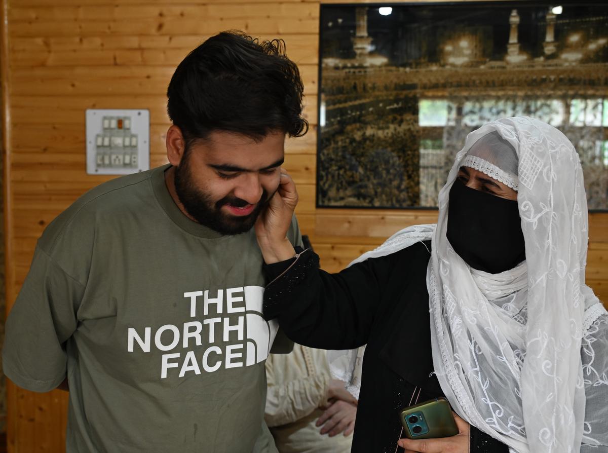 A Kashmiri who was studying in Iran at home with his mother in Srinagar.  