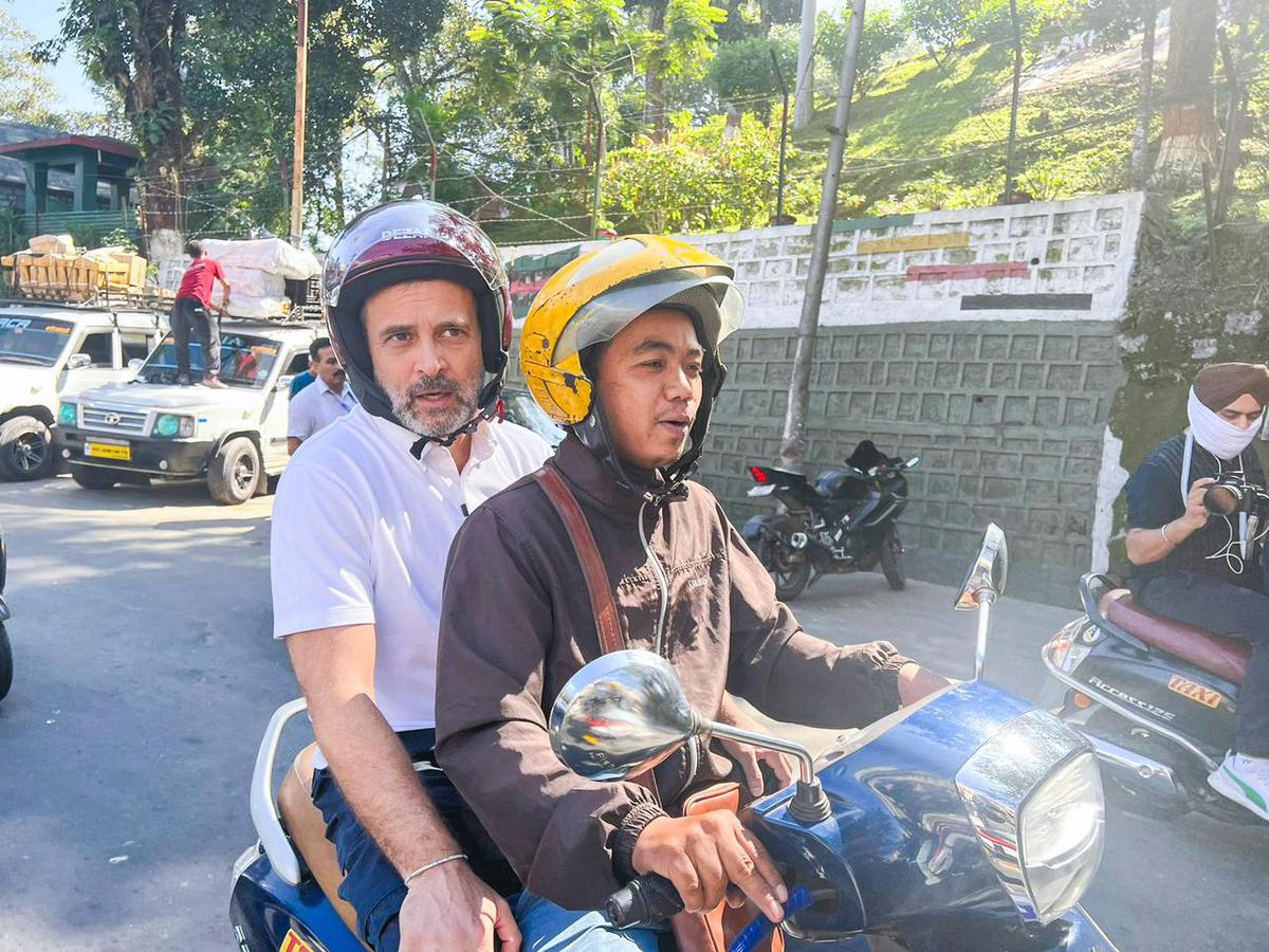 Rahul Gandhi rides pillion on scooter to meet former Mizoram CM - The Hindu