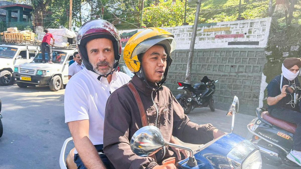 Rahul Gandhi rides pillion on scooter to meet former Mizoram CM