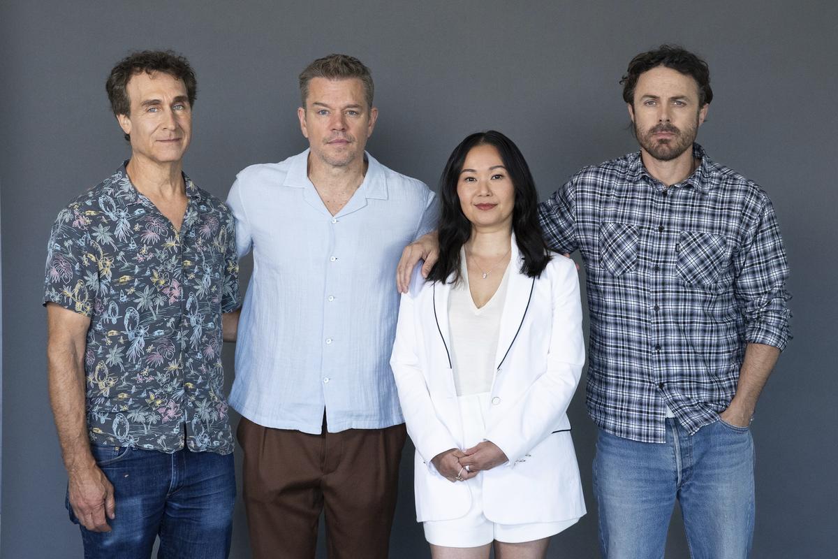 Director Doug Liman, left, poses with actors Matt Damon, Hong Chau and Casey Affleck to promote ‘The Instigators’