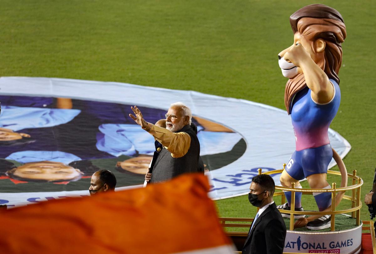 Prime Minister Narendra Modi during the inauguration of the 36th National Games in Ahmedabad. Official mascot for the National Games 2022- Savaj, the Asiatic lion, is also seen.