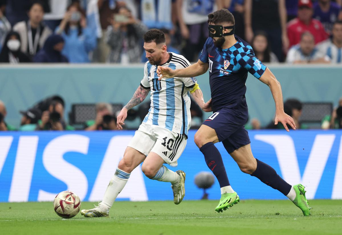 Lionel Messi of Argentina in action with Josko Gvardiol of Croatia during the FIFA World Cup Qatar 2022 semifinal