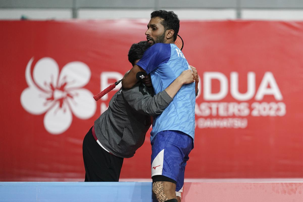 India’s H. S. Prannoy, right, hugs his coach after defeating China’s Weng Hong Yang in his men’s singles finals match at the Malaysia Masters badminton tournament at Bukit Jalil Axiata Arena in Kuala Lumpur, Malaysia, Sunday, May 28, 2023. 