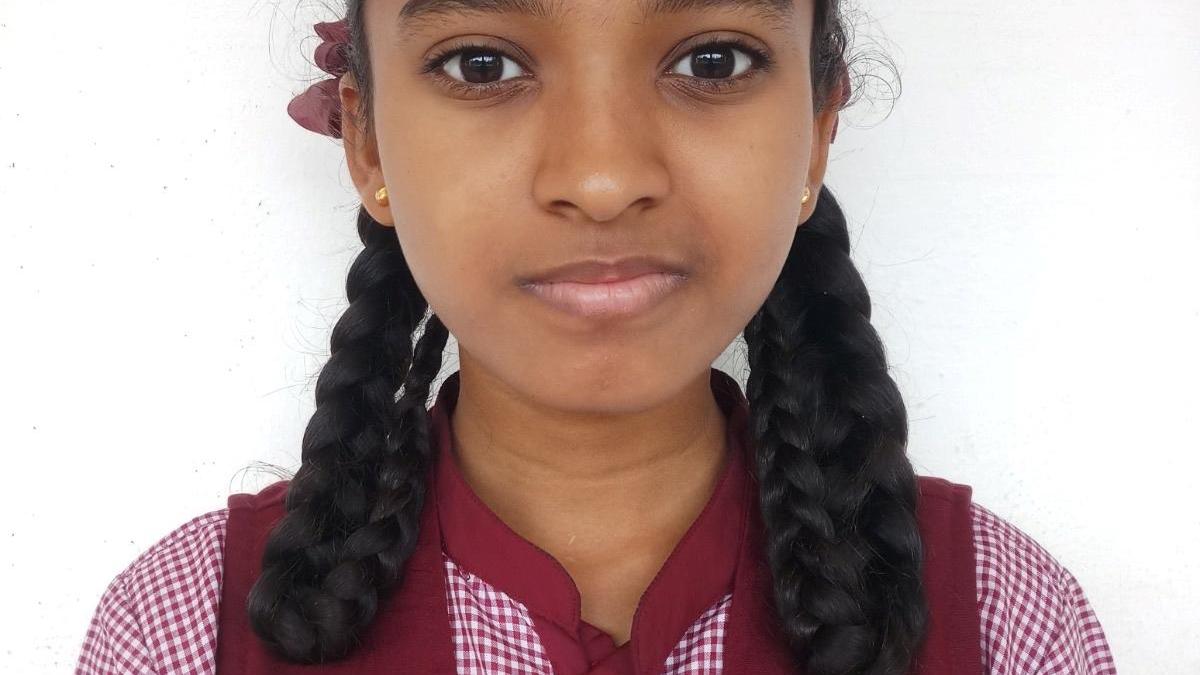 Daughter of daily wager scores 617/625 in SSLC exam-1