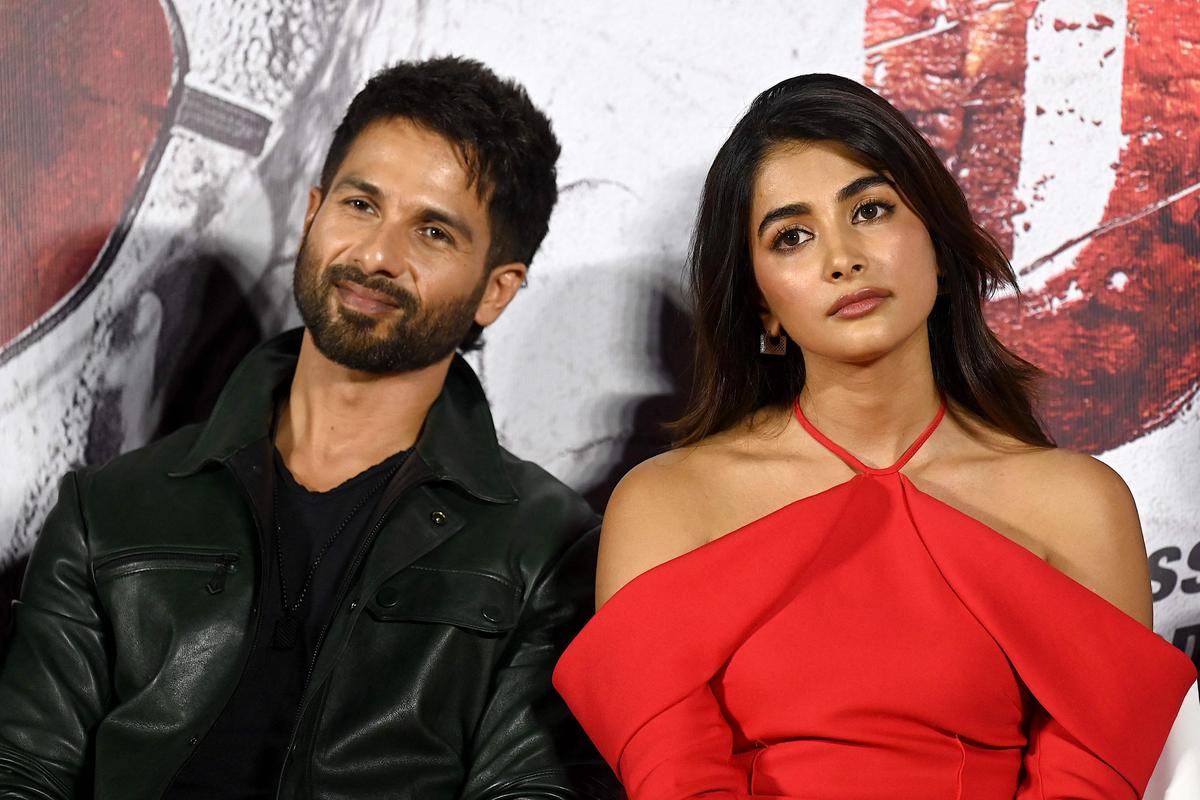 Bollywood actors Shahid Kapoor (L) and Pooja Hegde posted for pictures during the trailer launch of their Hindi-language film 'Dev' in Mumbai.