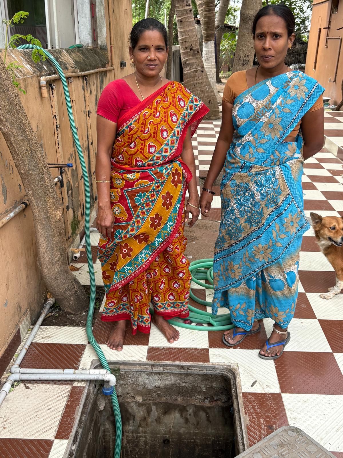 Fisherwomen R. Suganthi and S. Kalaichelvi show the sump tank at their house. 