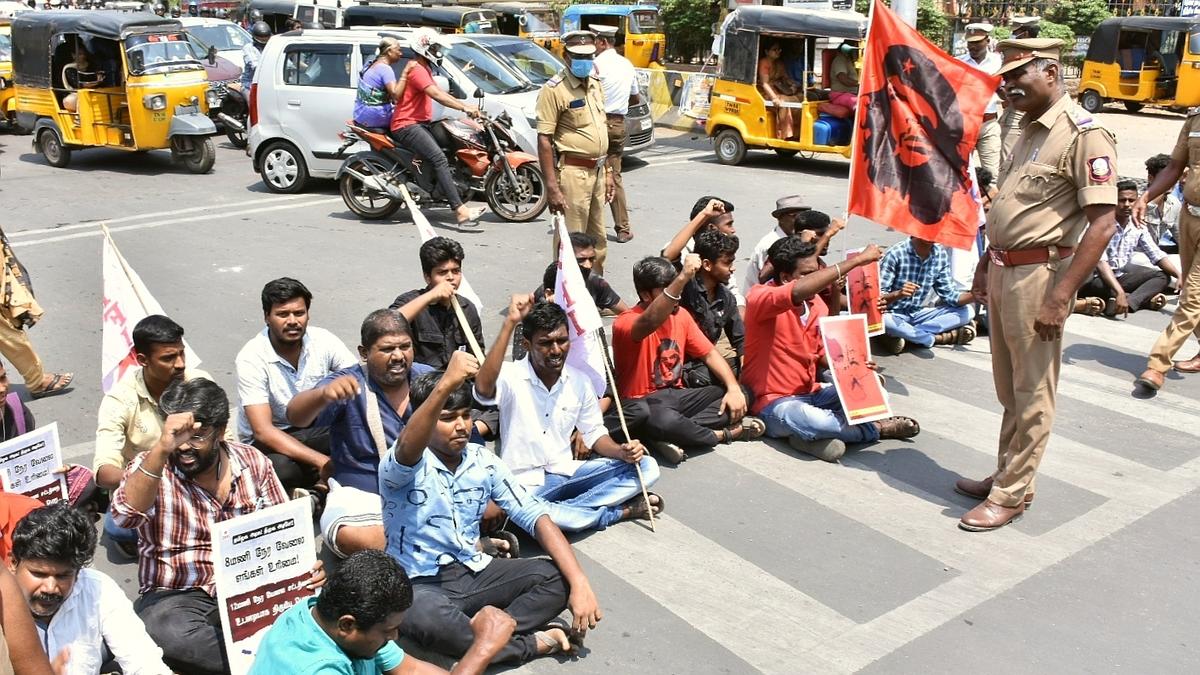 DYFI stages road roko demanding withdrawal of Bill allowing 12-hour shift in factories