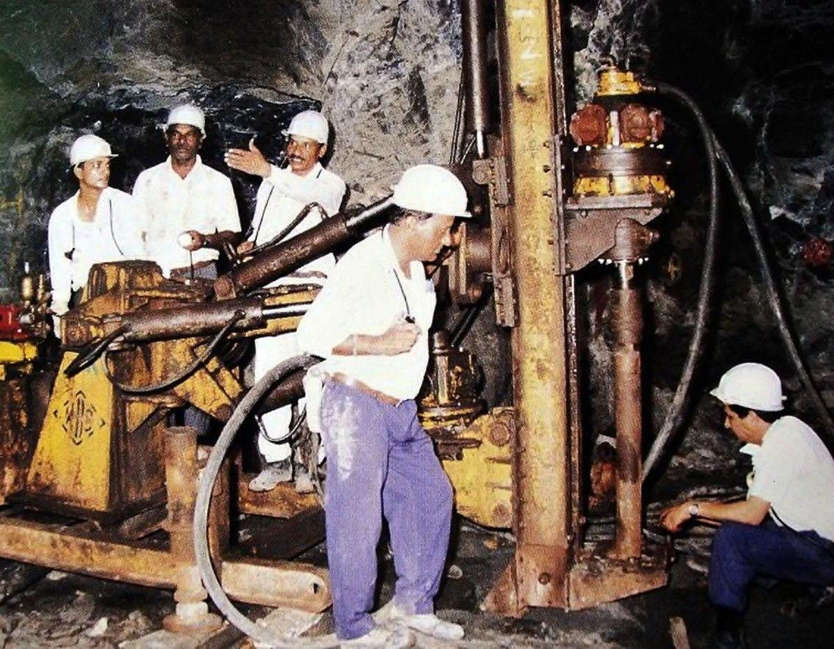 Workers seen drilling large diameter blast holes at the underground gold mine in Hutti in Raichur district.
