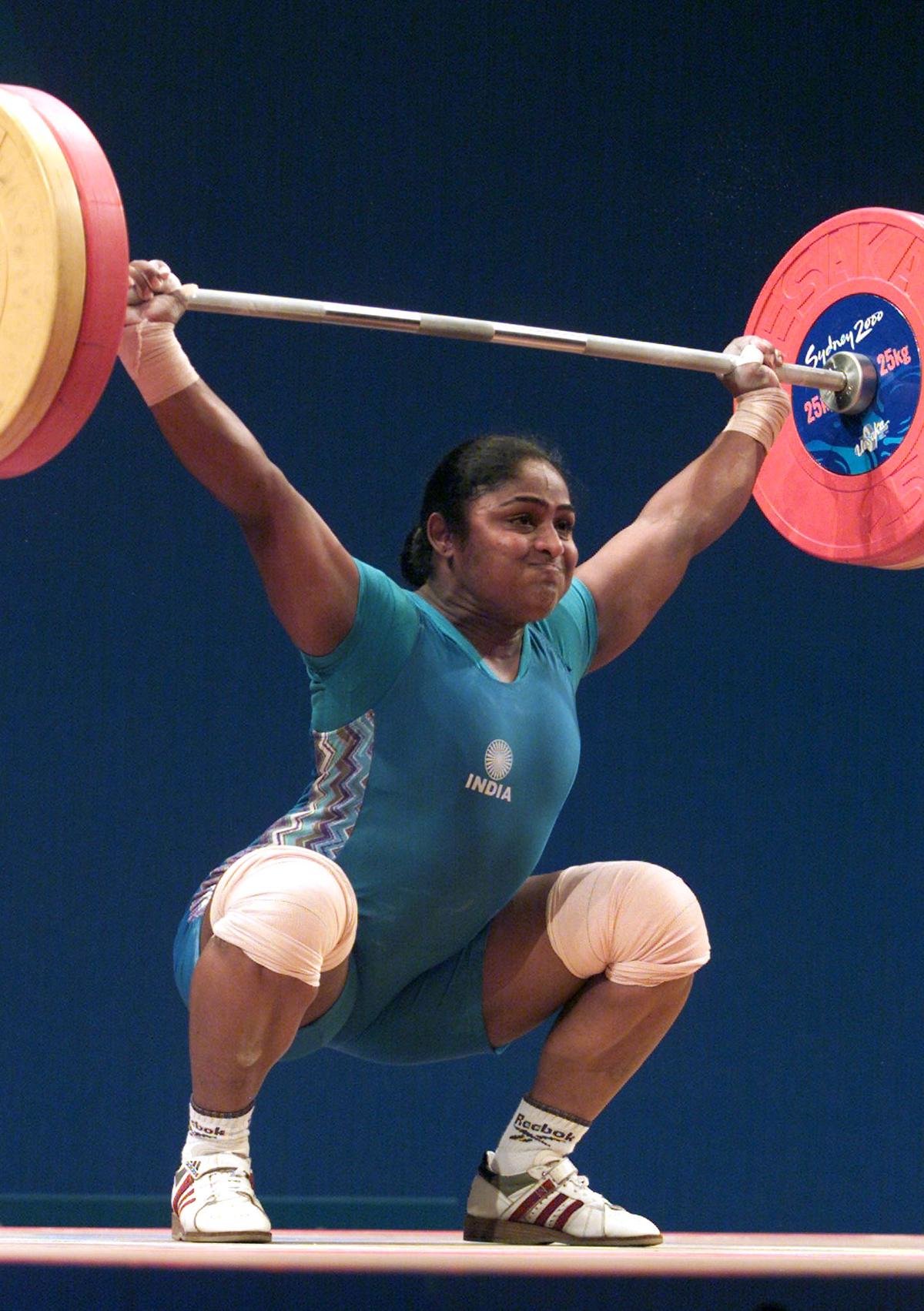 Karnam Malleswari lifts 105 kg in the women’s 69kg weightlifting snatch during the Sydney Olympics on September 19, 2000, a feat that won her the bronze medal.  