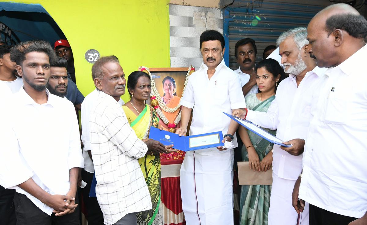 T.N. CM Stalin visits footballer Priya’s house, hands over solatium, job order for her brother