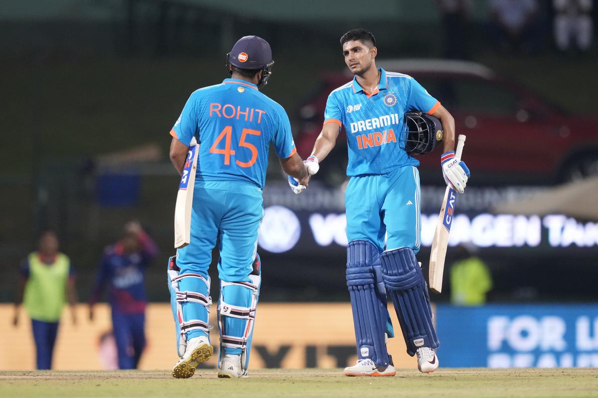 Rohit Sharma shakes hands with Shubman Gill as they celebrate their 10 wickets win in the Asia Cup cricket match between India and Nepal in Pallekele, Sri Lanka on Sep. 4. 
