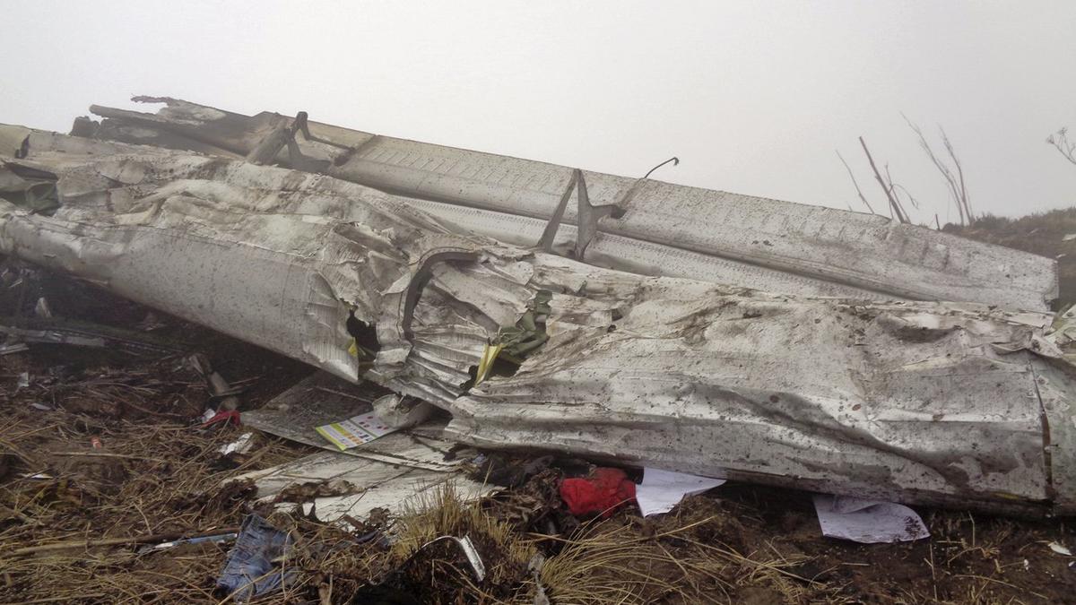 Fate of four Indians and 18 others unclear as rescuers locate burnt-out wreckage of missing Nepal plane