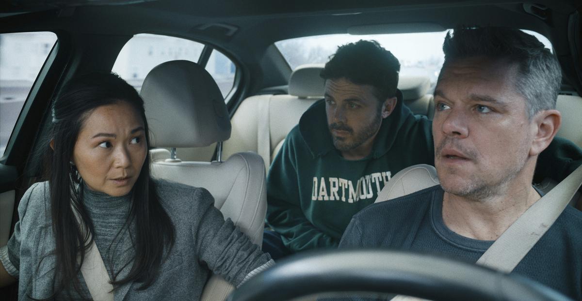 Hong Chau, Casey Affleck and Matt Damon in a scene from ‘The Instigators’